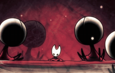 Cartoon Character Surrounded By Black Balls GIF