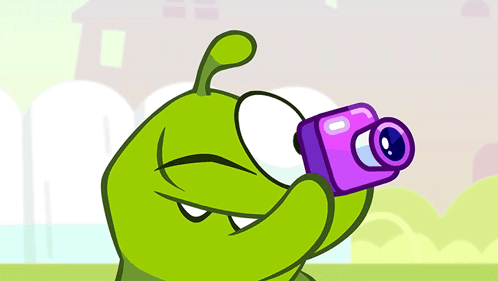 Cartoon Character Taking Picture With Pink Camera GIF