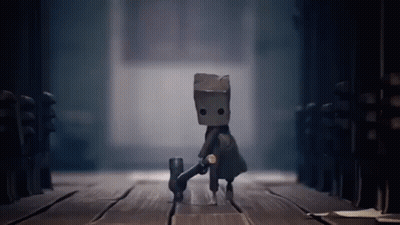 Cartoon Character Walking With Bag On Head GIF