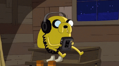 Cartoon Character Wearing Headphones Holding Cassette GIF
