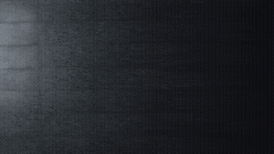 Cartoon Character With Beanie On Street At Night GIF