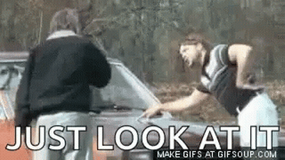 Cartoon Character With Beard Walking Down Sidewalk GIF
