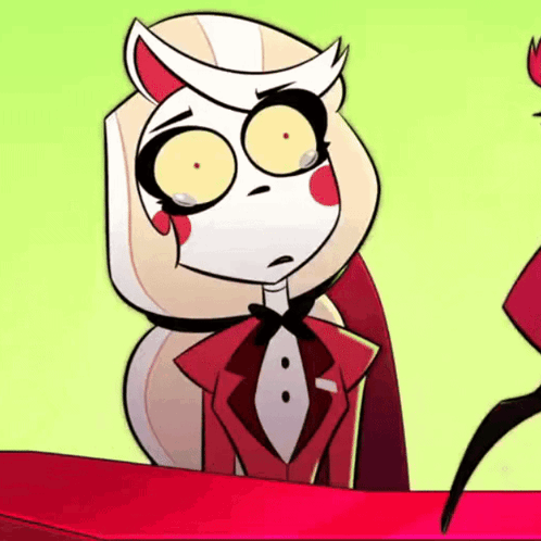 Cartoon Character With Big Eyes And Bow Tie On Table GIF