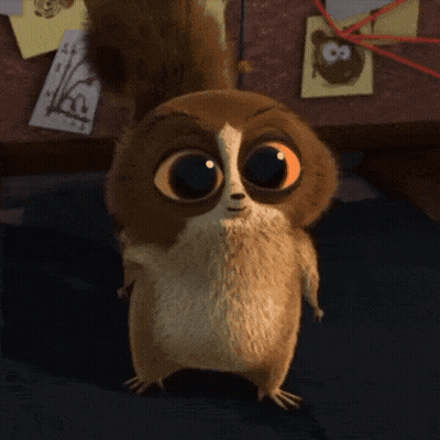 Cartoon Character With Big Orange Eyes GIF