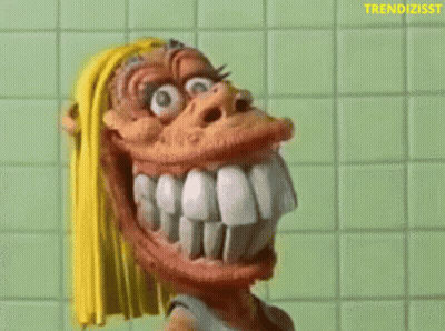 Cartoon Character With Big Teeth Holding Toothbrush GIF