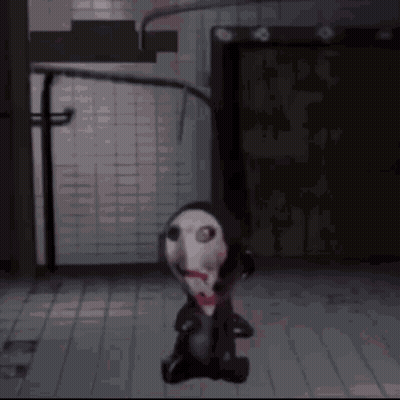 Cartoon Character With Bloody Face Sitting In Dark Room GIF