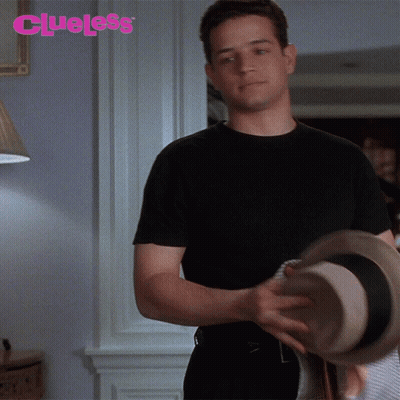 Cartoon Character With Blue Eyes And Black Shirt GIF