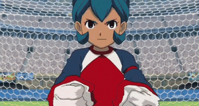 Cartoon Character With Blue Hair Standing In Front Of Goal GIF