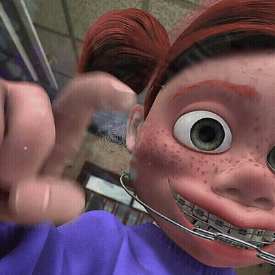 Cartoon Character With Braces And Freckles GIF