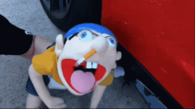 Cartoon Character With Cigarette Held By Person GIF