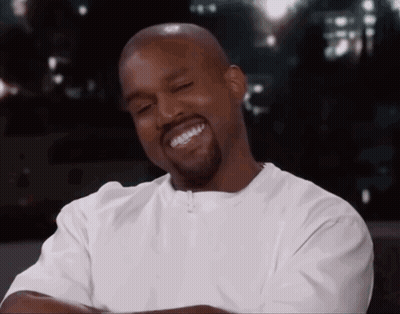 Cartoon Character With D Shirt Holding Smiley GIF
