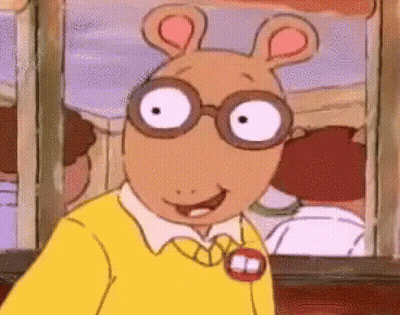 Cartoon Character With Glasses And Yellow Sweater Smiling GIF