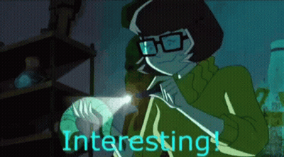 Cartoon Character With Glasses Holding Flashlight Saying Interesting GIF