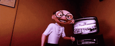 Cartoon Character With Glasses In Front Of TV GIF