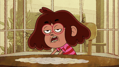 Cartoon Character With Glasses Sitting At Table Mouth Open GIF