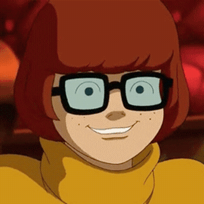 Cartoon Character With Glasses Smiling GIF
