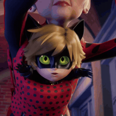 Cartoon Character With Green Eyes Held by Older Woman