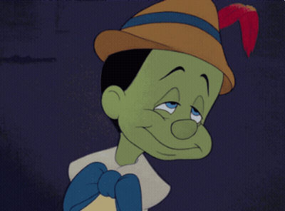 Cartoon Character With Green Face And Hat GIF
