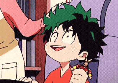 Cartoon Character With Green Hair Holding Toy GIF
