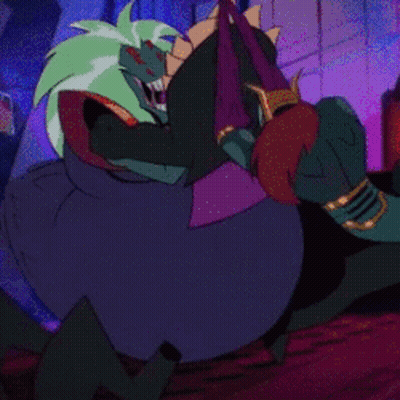 Cartoon Character With Green Hair Next To Large Wheel GIF