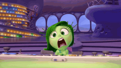 Cartoon Character With Green Hair Sitting At Desk Mouth Open GIF