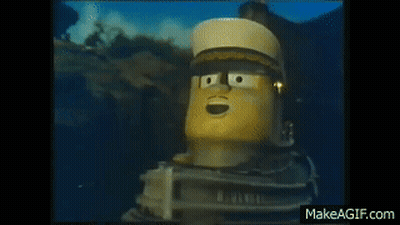 Cartoon Character With Hat Standing In Water Smiling GIF