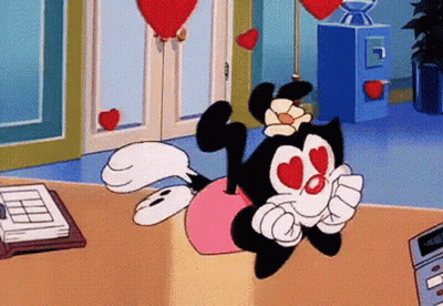 Cartoon Character With Hearts In Her Eyes GIF