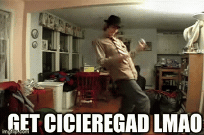 Cartoon Character With Lemon On Head Holding Dance Box GIF