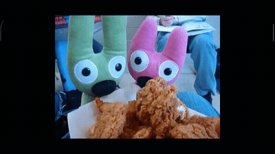 Cartoon Character With Plushies Hoops Yo-Yo And Chicken Wings GIF