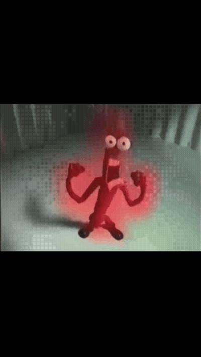 Cartoon Character With Red Light From Mouth In Dark Room GIF