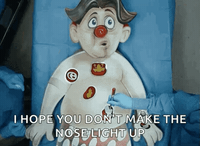Cartoon Character With Red Nose Being Operated GIF