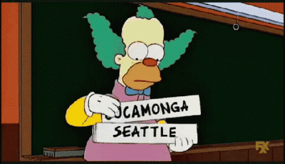 Cartoon Character With Sign Saying Camonga Seattle GIF