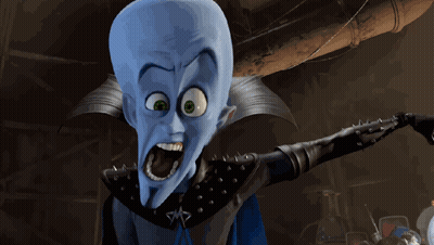 Cartoon Character With Spiked Cape And Huge Head GIF
