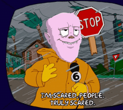 Cartoon Character With Stop Sign GIF