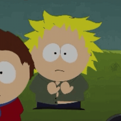 Cartoon Character With Yellow Hair And White Eyes GIF