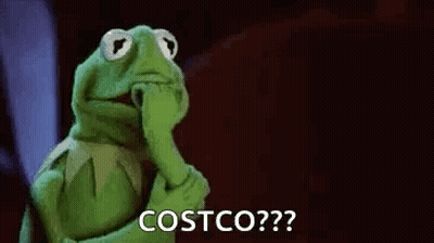 Cartoon Characters Sitting Around Table Saying One Of Us GIF