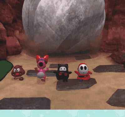 Cartoon Characters Standing Around Large Rock GIF