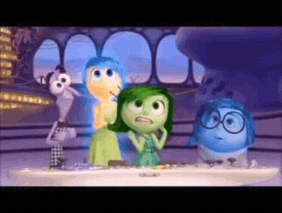 Cartoon Characters Standing Around Table GIF