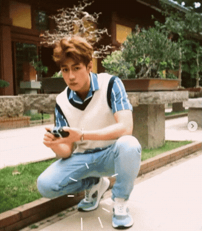 Cartoon Characters Standing On Sidewalk GIF