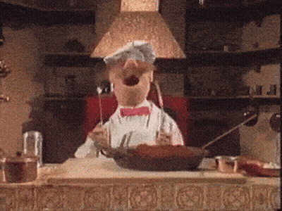 Cartoon Chef Making Funny Face While Cooking GIF