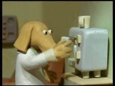 Cartoon Dog Head Standing Next To Machine GIF