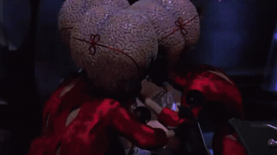 Cartoon Dog Head Surrounded By Characters GIF