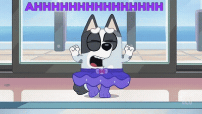 Cartoon Dog In Purple Skirt Says Ahhhh GIF
