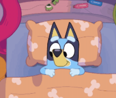 Cartoon Dog Lying In Bed GIF