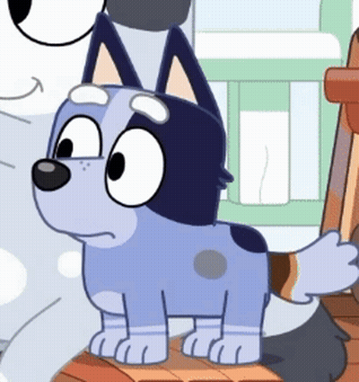 Cartoon Dog Standing Next To Another Dog In Crib GIF