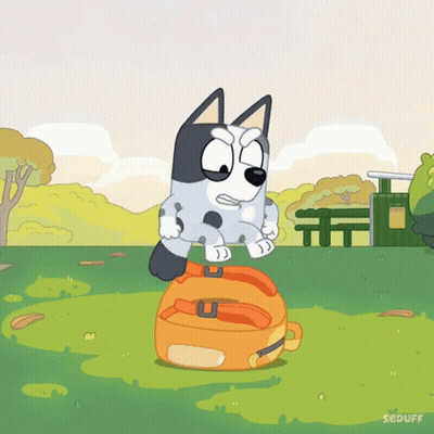 Cartoon Dog Standing On Orange Suitcase GIF