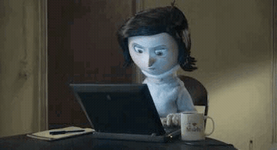 Cartoon Doll Typing On Laptop GIF