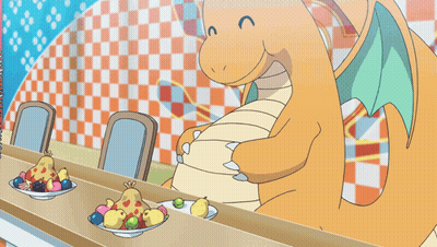 Cartoon Dragon Standing In Front Of Counter With Bowls Of Fruit GIF