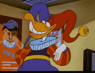 Cartoon Duck In Purple And Red Jester Hat GIF