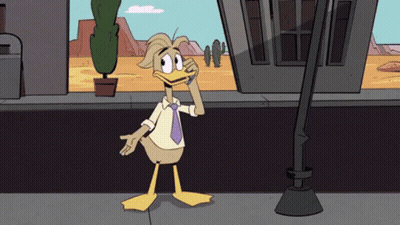 Cartoon Duck In White Shirt And Tie Talking On Phone GIF